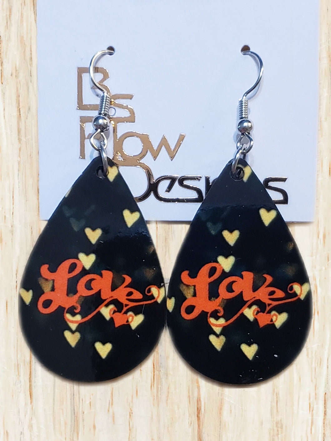 LOVE Beige Hearts Black Background Earrings